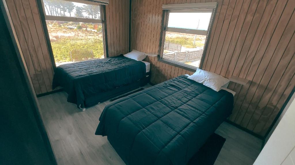 Llit o llits en una habitació de Cabaña Tagua - Curaquilla Lodge "Entre humedales y el Mar"