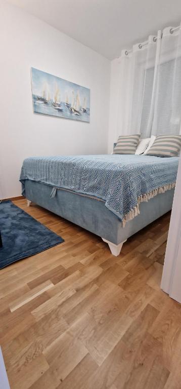 Postel nebo postele na pokoji v ubytování Portovaradin