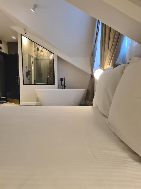 Krevet ili kreveti u jedinici u okviru objekta Hotel Bohemian Garni - Skadarlija