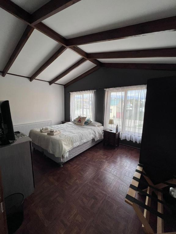 Uma cama ou camas num quarto em SHEUEN PATAGONIA
