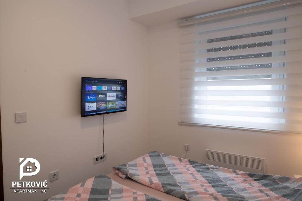 Postel nebo postele na pokoji v ubytování Petković apartmani 48