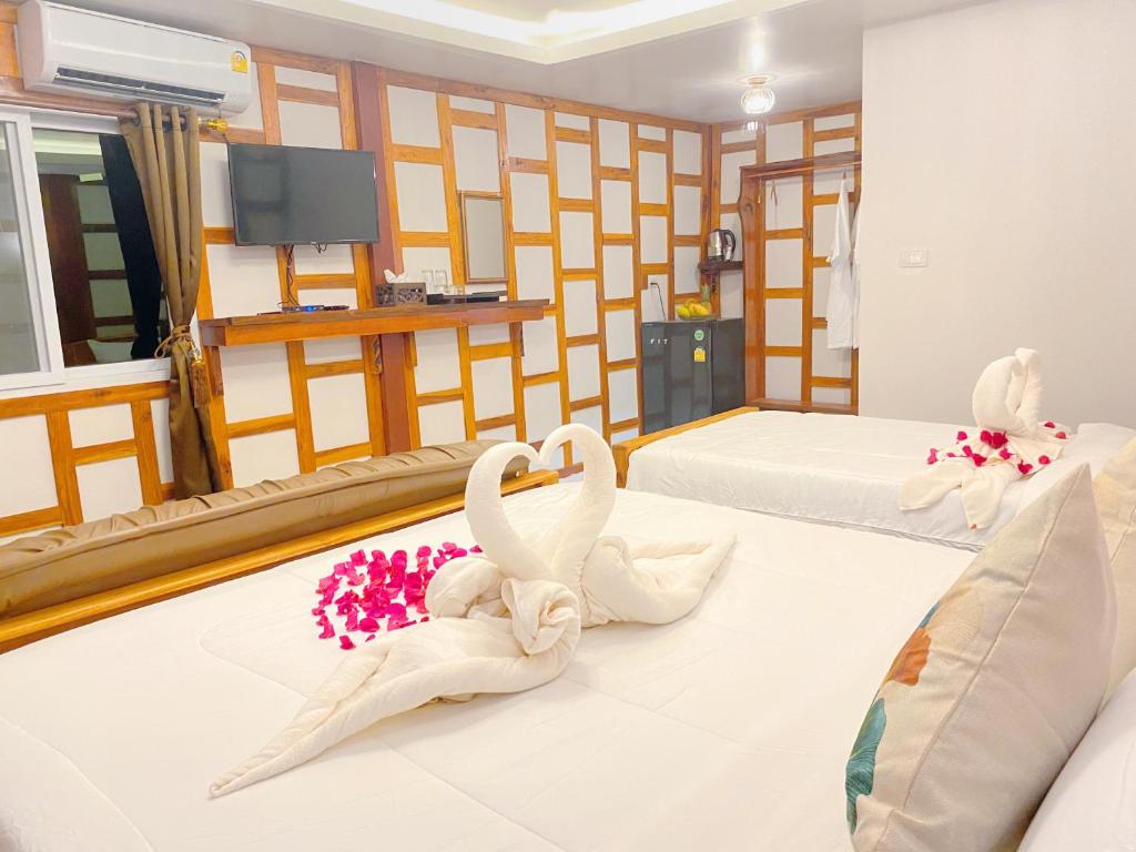 Postel nebo postele na pokoji v ubytování Relaxing House Koh Yao Yai