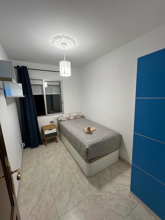 Postel nebo postele na pokoji v ubytování Penthouse-Complex Cristimar