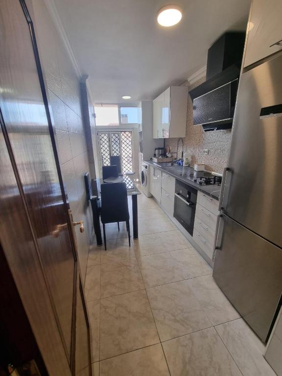 Kuchyň nebo kuchyňský kout v ubytování Penthouse-Complex Cristimar
