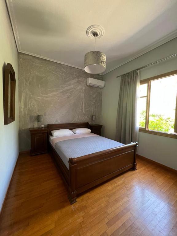 Postel nebo postele na pokoji v ubytování Villa Flower
