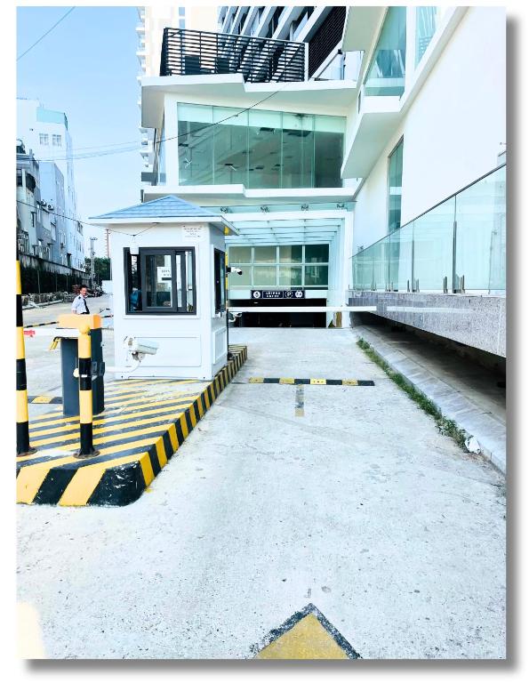 a large white building with a building at FLC Luxury Apartment Quy Nhon in Quy Nhon