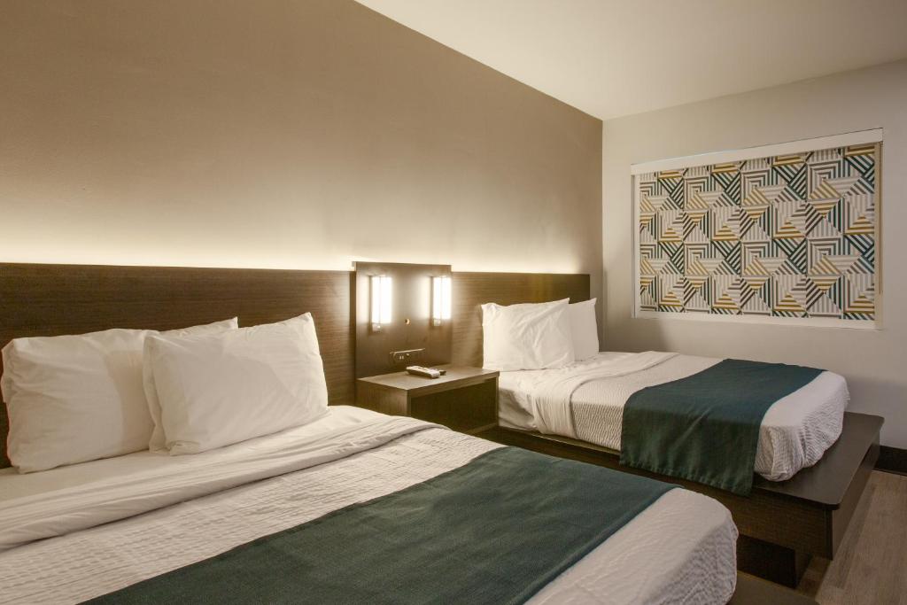 Postel nebo postele na pokoji v ubytování Motel 6 Williams AZ Downtown Grand Canyon