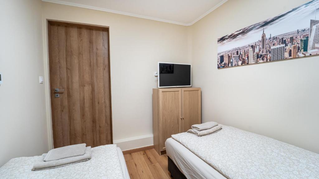 Postel nebo postele na pokoji v ubytování Palmy Home Dunakeszi
