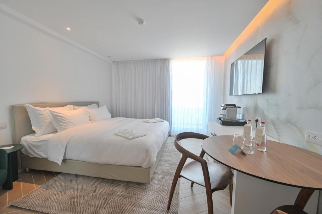 Postel nebo postele na pokoji v ubytování AKOYA HOTEL