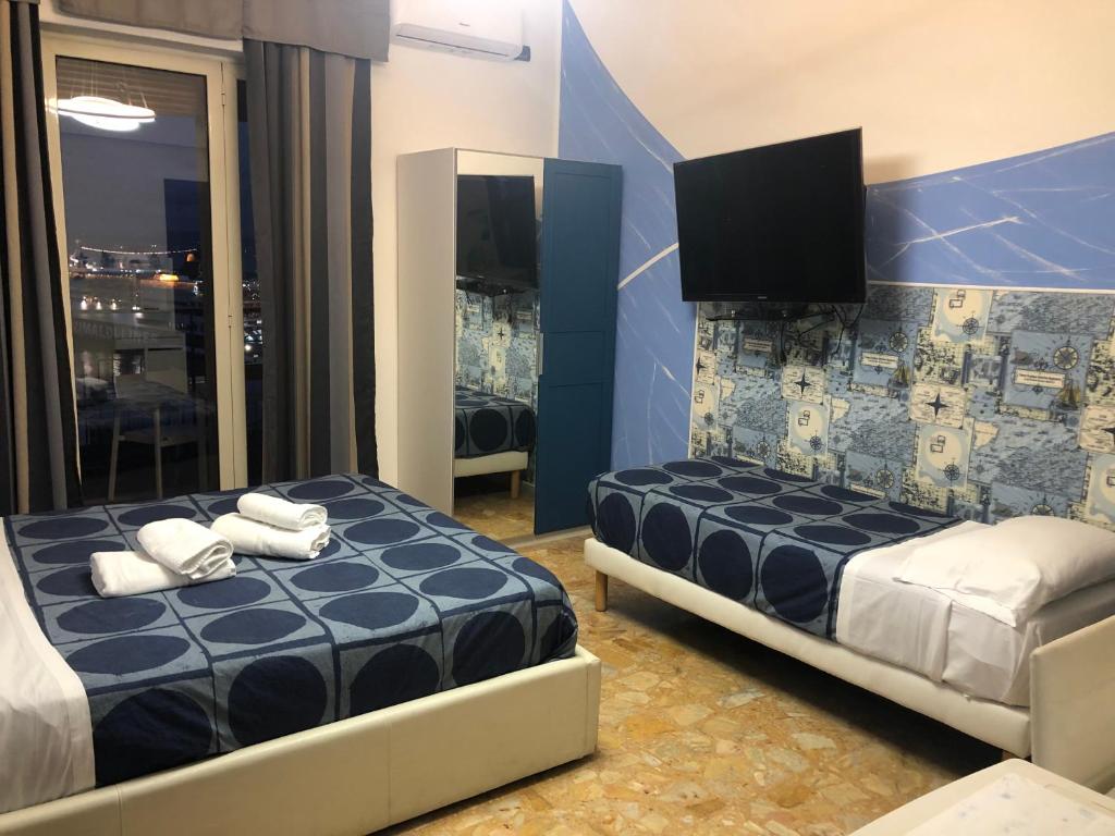 Łóżko lub łóżka w pokoju w obiekcie Marina SKY 8