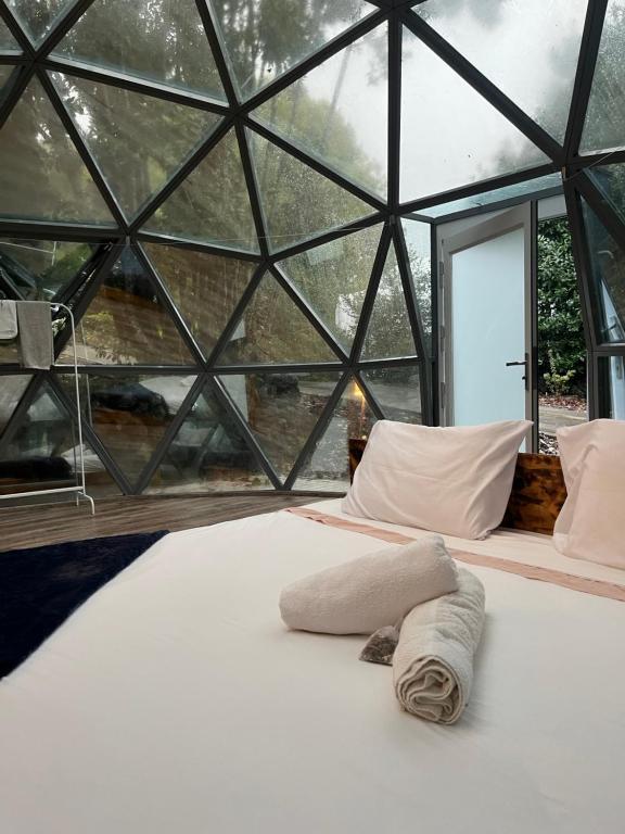 Postel nebo postele na pokoji v ubytování Quinta do Abacate - Glamping Park