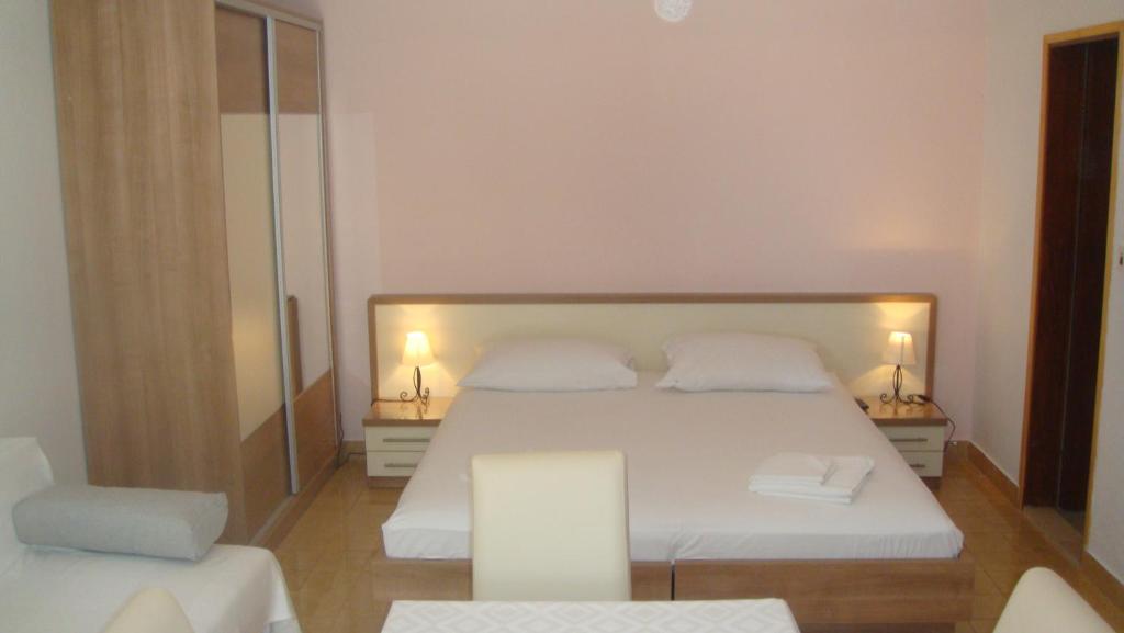 Postel nebo postele na pokoji v ubytování Apartments Topo