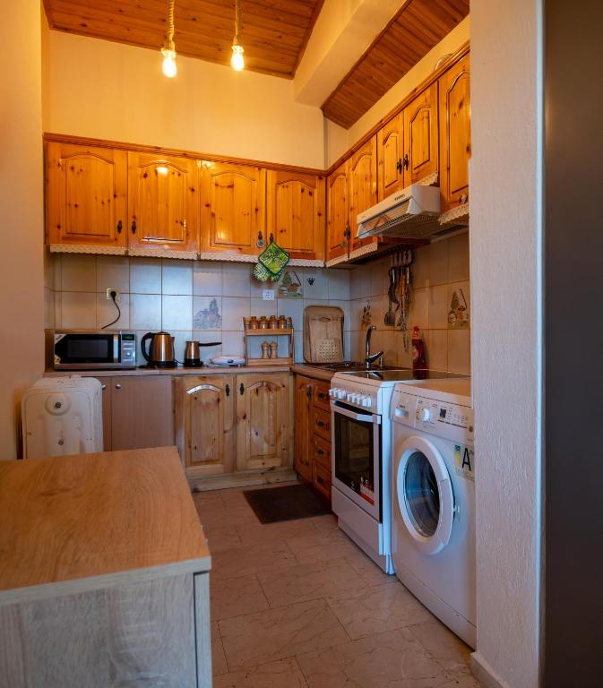 Kuchyň nebo kuchyňský kout v ubytování Konstantina's Suite