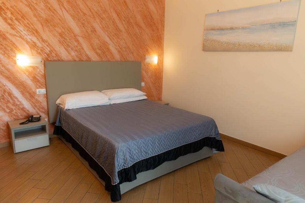 Cama o camas de una habitación en Porto Di Claudio