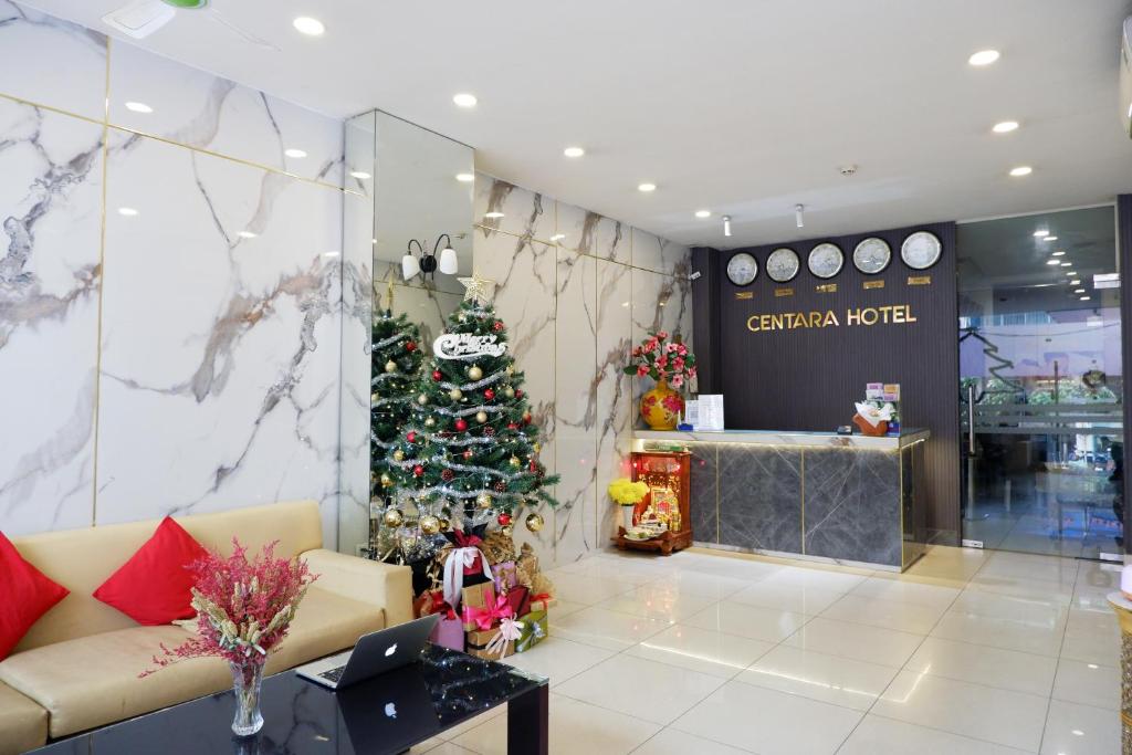 a christmas tree in the middle of a store at Centara Saigon Hotel - 270 Ly Tu Trong in Ho Chi Minh City