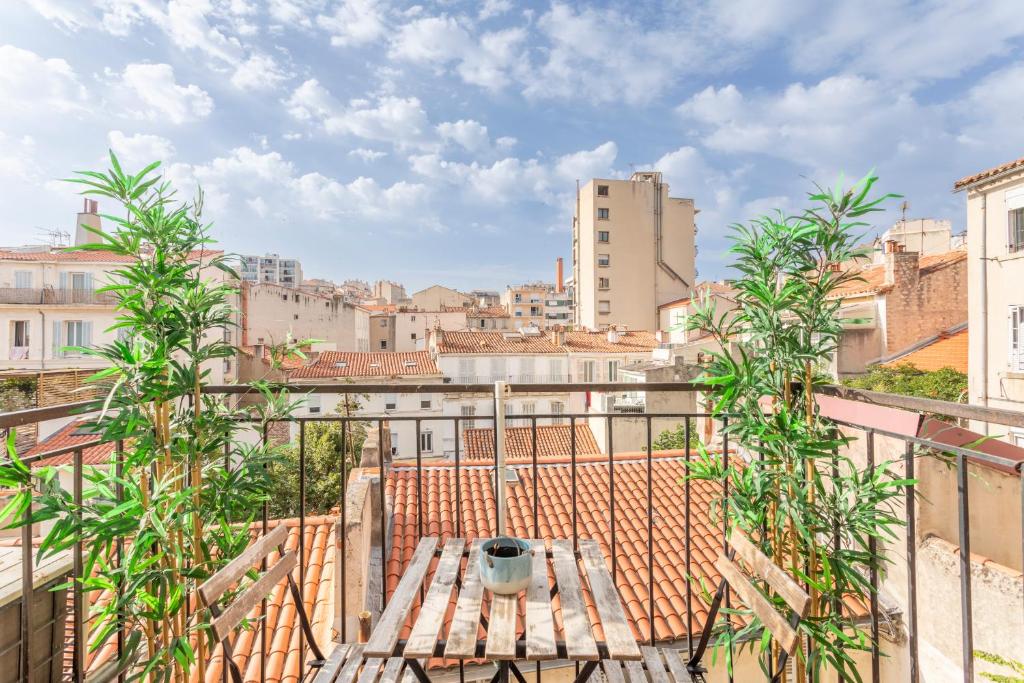 a balcony with a view of a city at Calme, soleil, plage - Catalans in Marseille