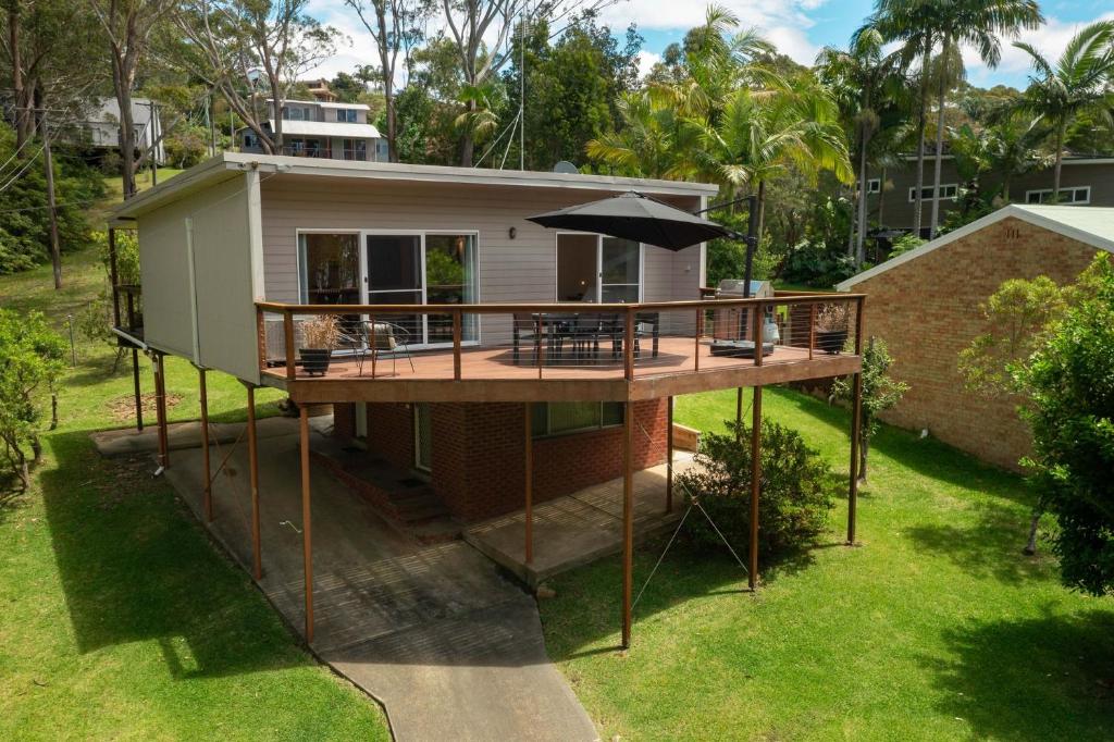 an aerial view of a house with a deck at Rocks Place by Experience Jervis Bay in Vincentia