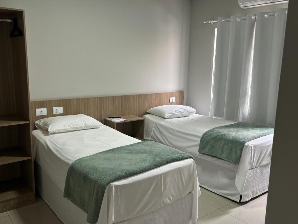 Postel nebo postele na pokoji v ubytování Mahle Hotel