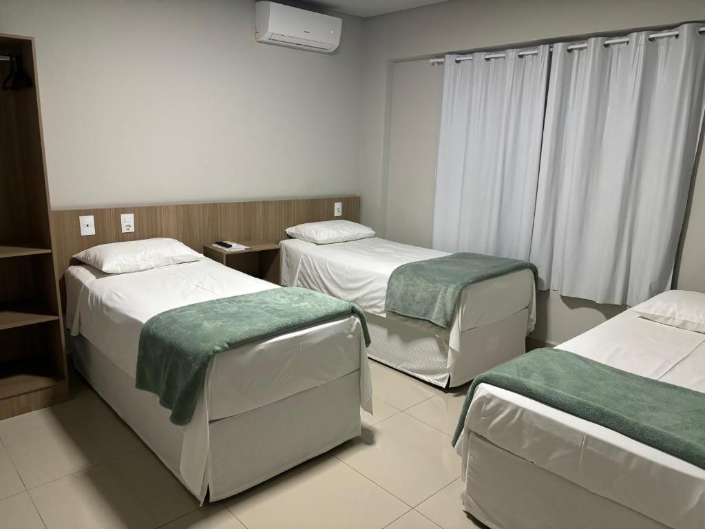 Postel nebo postele na pokoji v ubytování Mahle Hotel