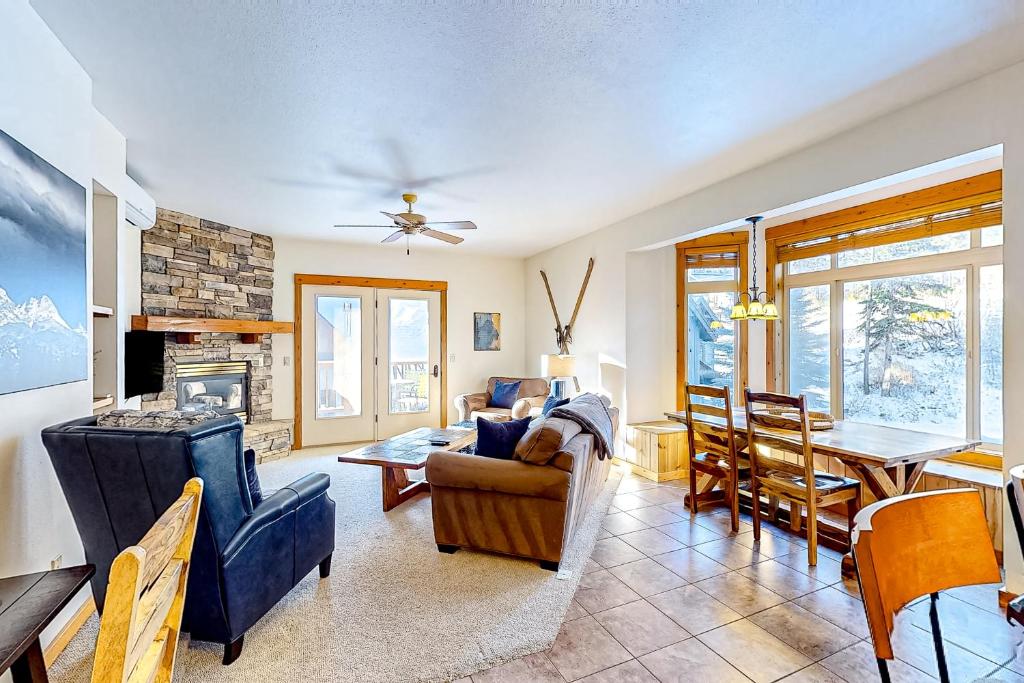 a living room with a couch and a fireplace at Black Diamond #2B in Whitefish