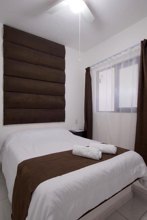 Postel nebo postele na pokoji v ubytování Hotel Villa 12 TX