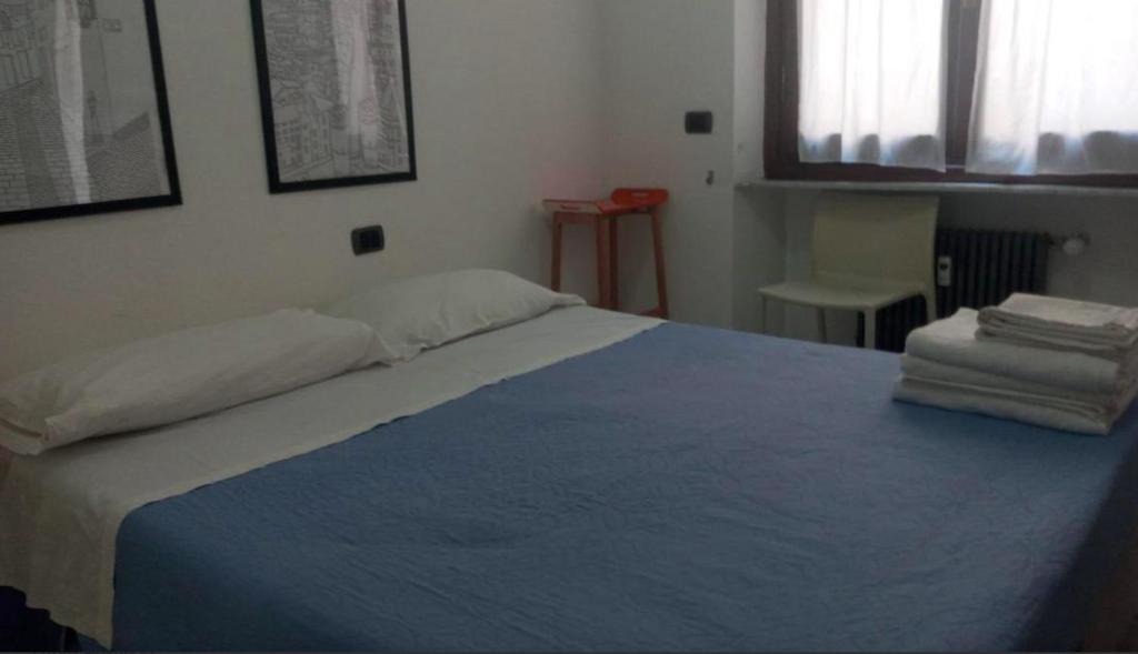 Postel nebo postele na pokoji v ubytování B&B Al Molo