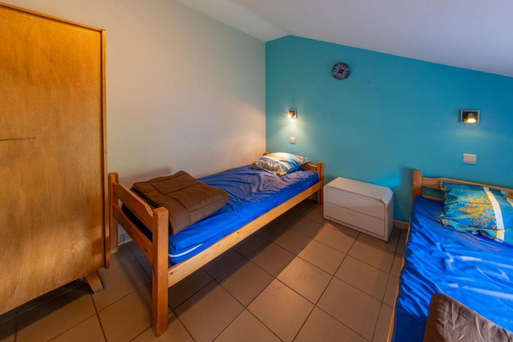 Postel nebo postele na pokoji v ubytování Sol Battire