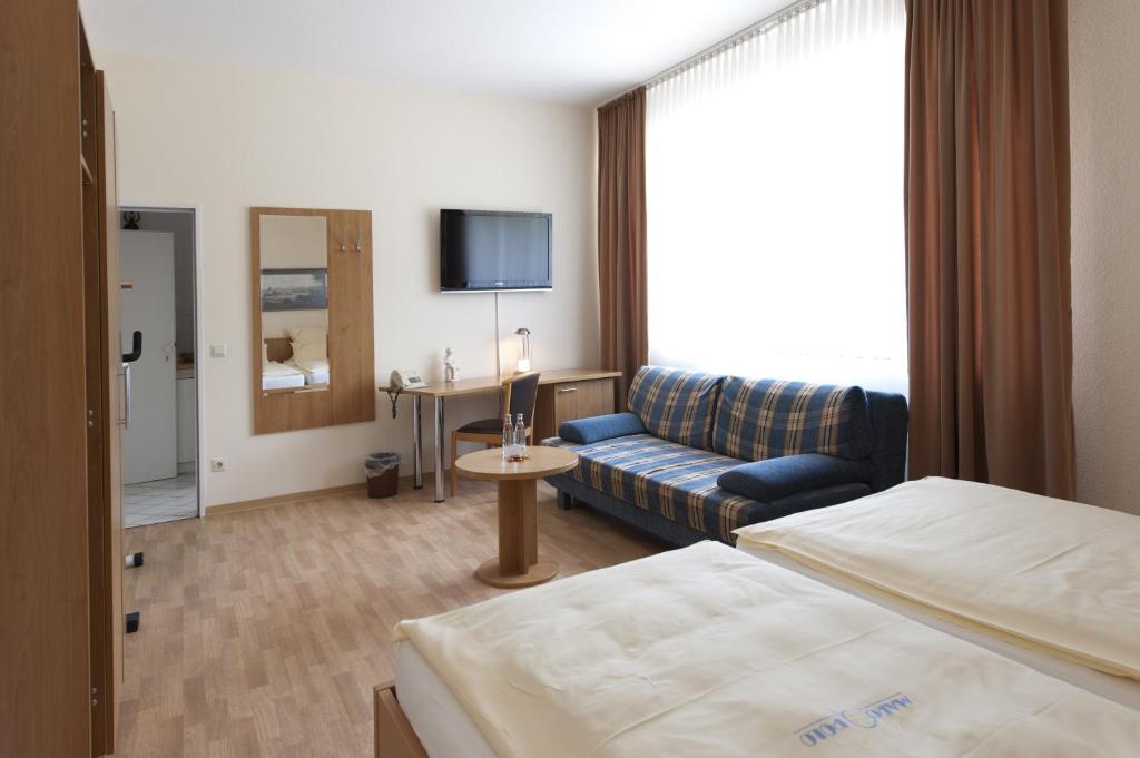 TV a/nebo společenská místnost v ubytování Hotel Marco Polo
