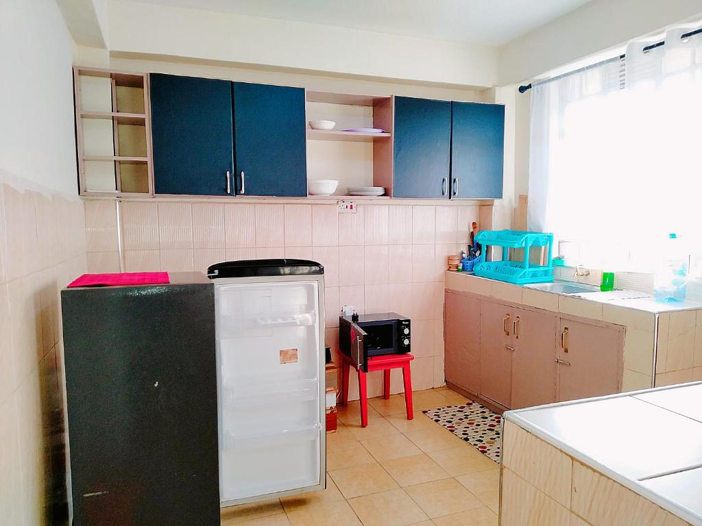 Kuchyň nebo kuchyňský kout v ubytování Cozy Haven