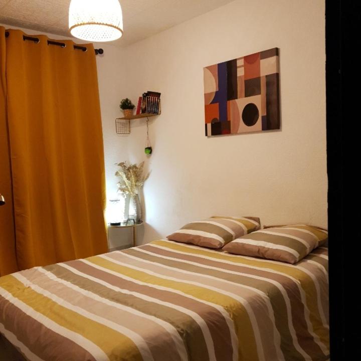Postel nebo postele na pokoji v ubytování Jolie charmant T3 refait à neuf à Marseille