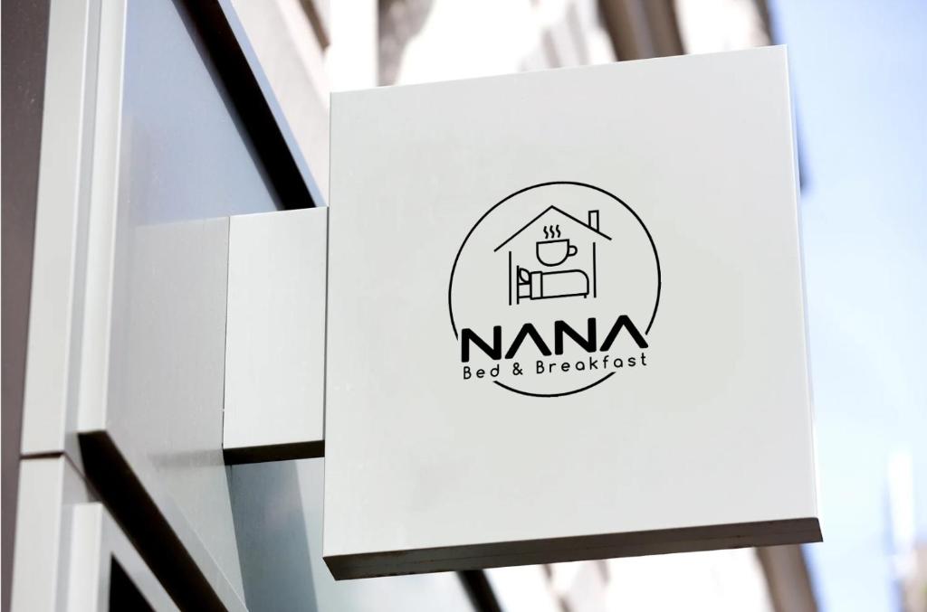a logo for a real estate company at Hostal NANA B&B in Arroyo de la Encomienda