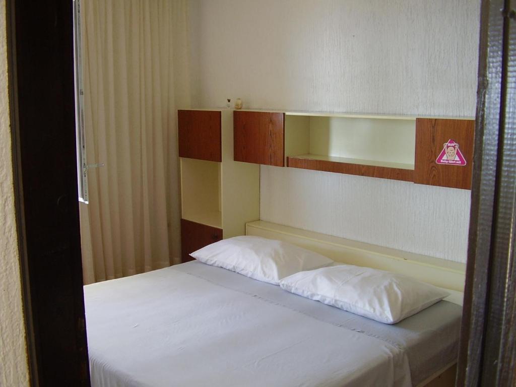 Posteľ alebo postele v izbe v ubytovaní Petar Apartment