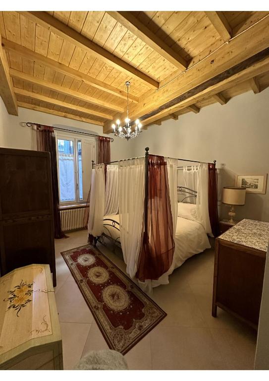 Postel nebo postele na pokoji v ubytování Appartamenti La Vecchia Latteria