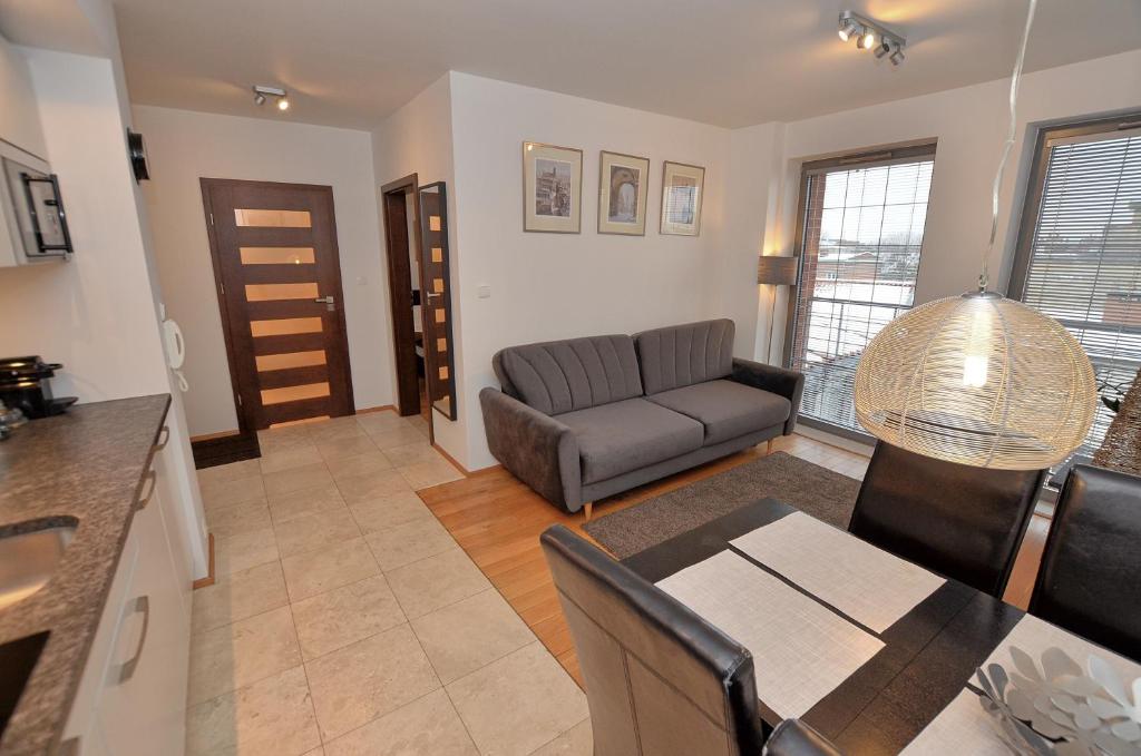 Posedenie v ubytovaní Tartaczna Deluxe Apartments Gdansk