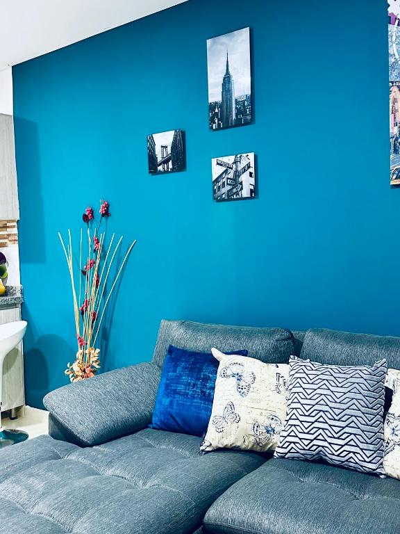 Posezení v ubytování Apartamento Privado Vacacional a 5m del Aeropuerto, 20 minutos del Parque del Cafe y Centro de Armenia con 4 Piscinas, 3 Jacuzzi, Sauna By Molca Xperiences 3H