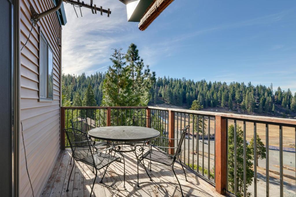 a patio with a table and chairs on a balcony at Strawberry Townhouse Walk to Leland Snowplay! in Strawberry