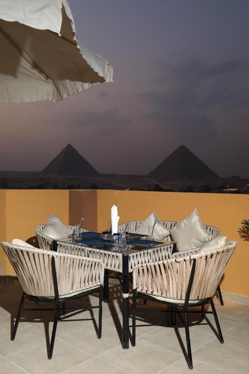 Balkón nebo terasa v ubytování Pyramids Heart Hotel