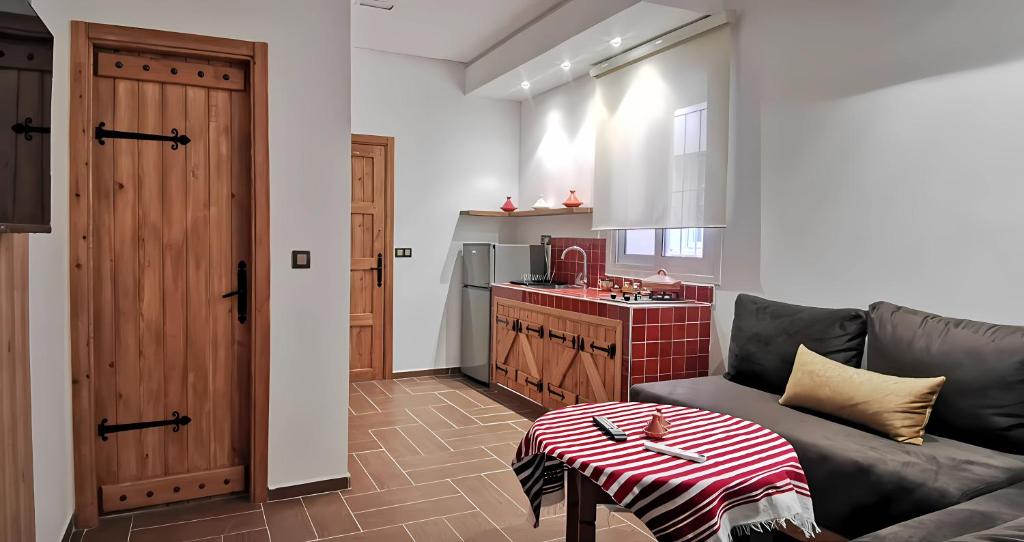 Kuchyň nebo kuchyňský kout v ubytování Aparthotel Dar Nowara Chaouen