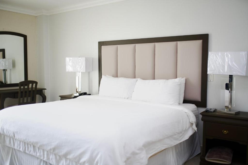 Voodi või voodid majutusasutuse Hotel Quinta Real toas