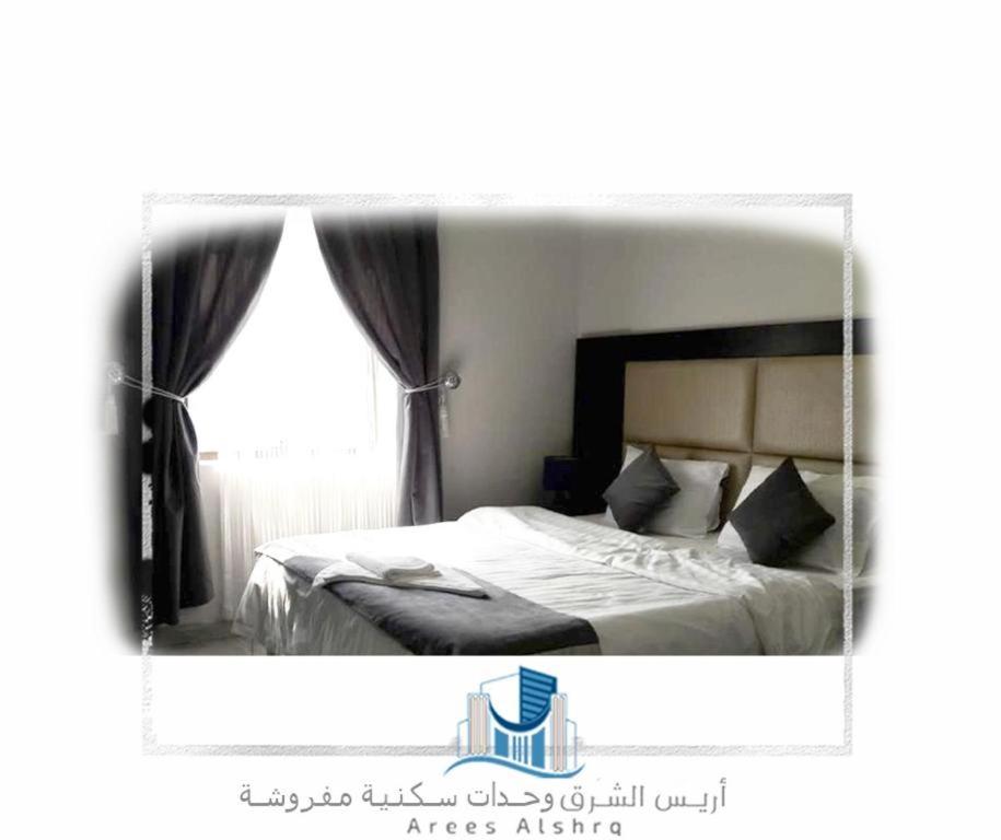 Postel nebo postele na pokoji v ubytování Arees Al Sharq Served Apartments