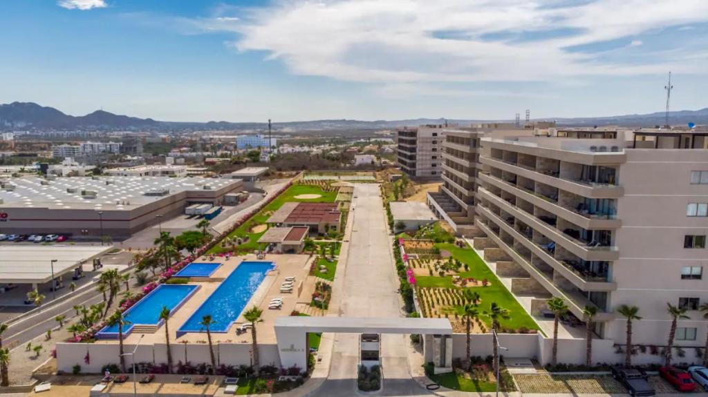 an aerial view of a building and a pool at Lumina at Vista Velas II Los Cabos in El Pueblito