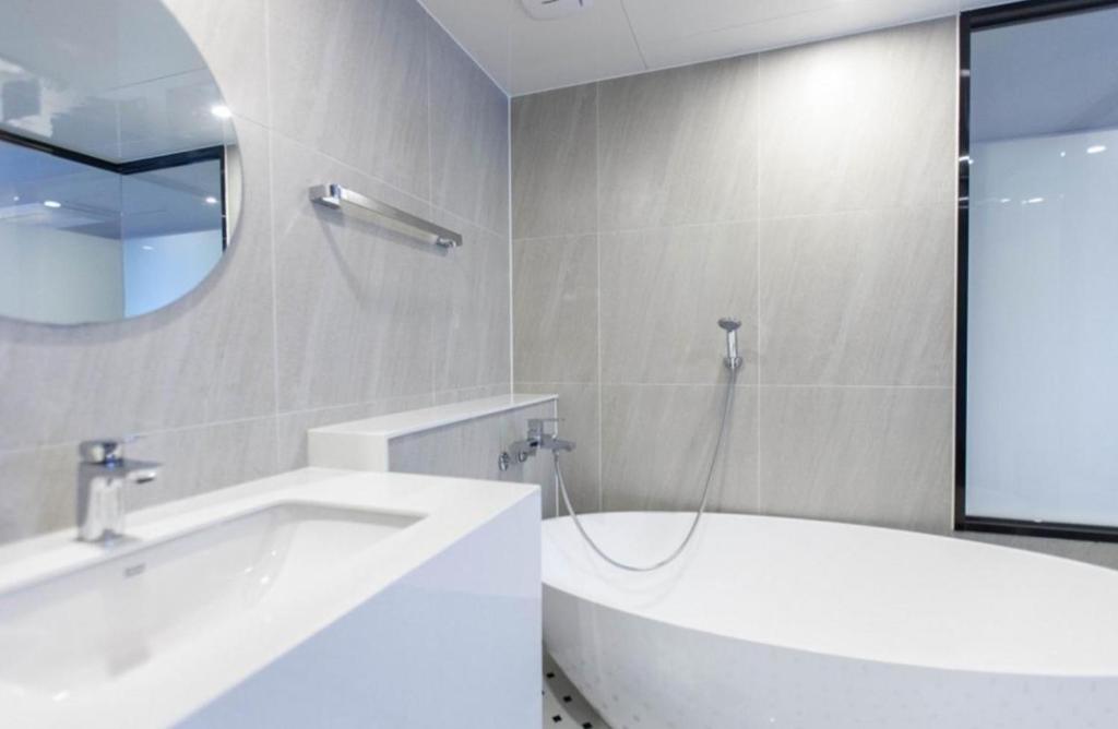 Koupelna v ubytování Brown Dot Hotel Hadan