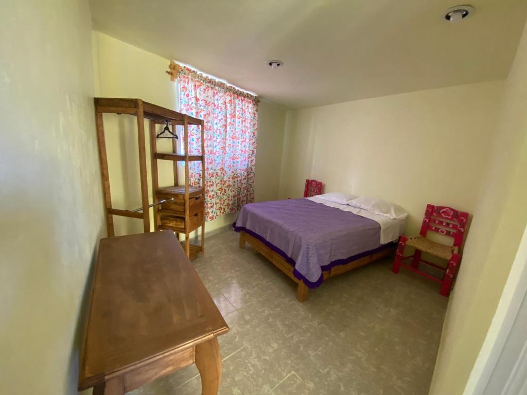Postel nebo postele na pokoji v ubytování Casa Meraki