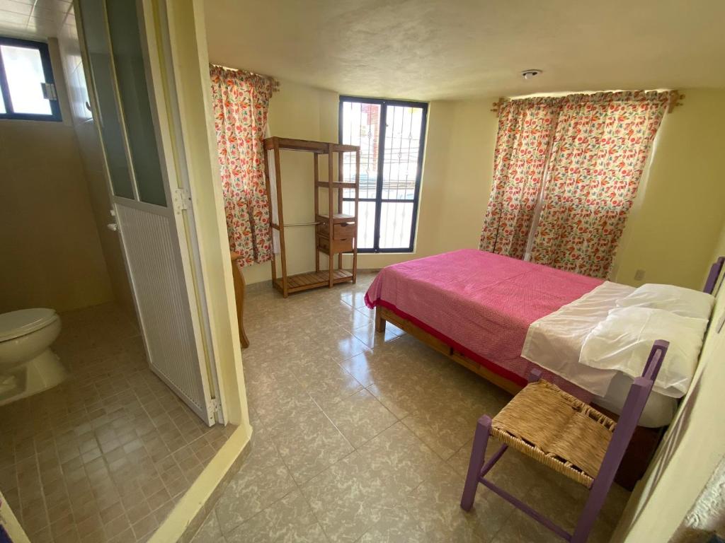 Postel nebo postele na pokoji v ubytování Casa Meraki