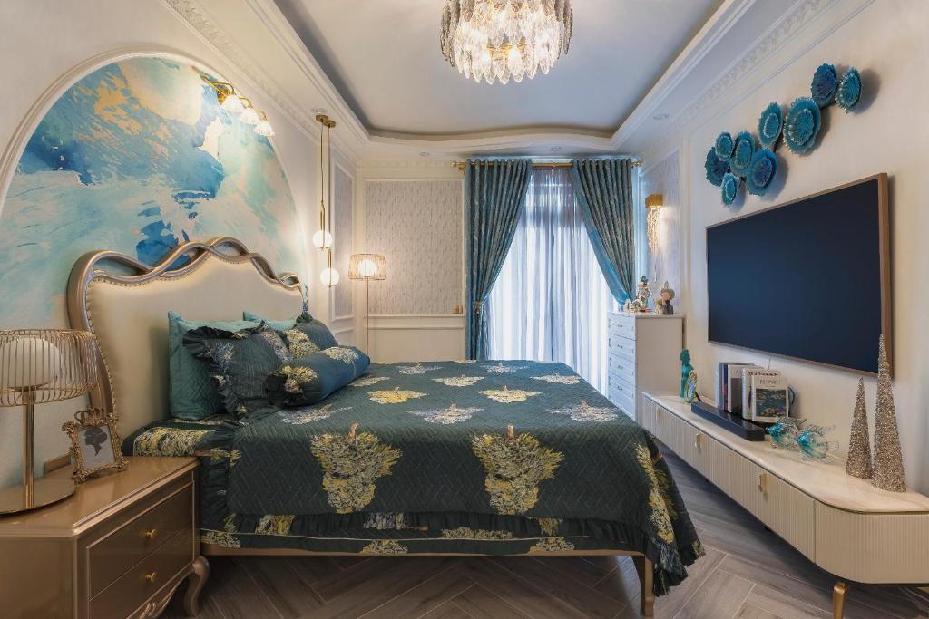 a bedroom with a bed and a large painting on the wall at Broccoli's House (Súp Lơ House) in Da Lat