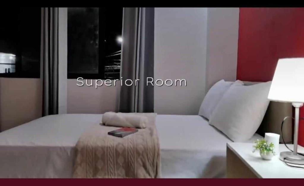Llit o llits en una habitació de Mantra Pensionne Superior Room