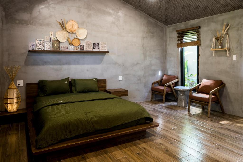 Giường trong phòng chung tại Eco House Villa