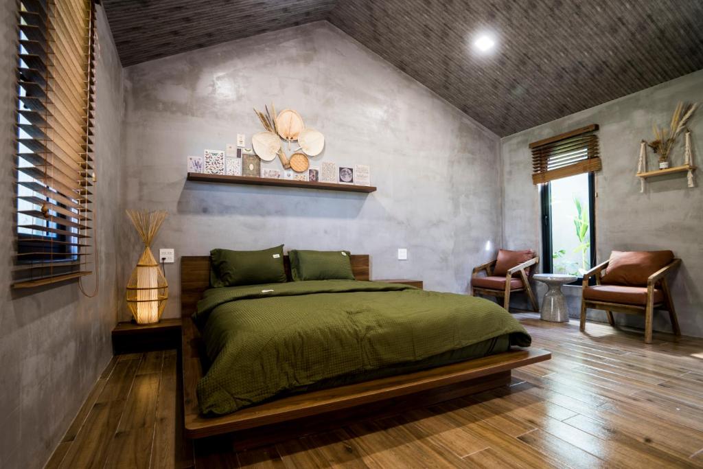 Giường trong phòng chung tại Eco House Villa