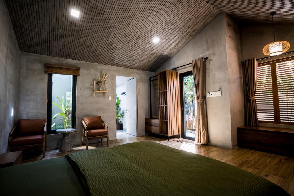 Giường trong phòng chung tại Eco House Villa