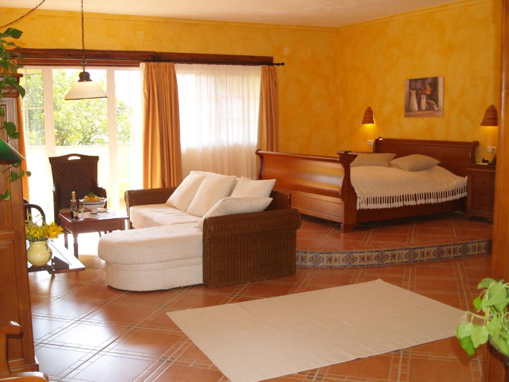 Postel nebo postele na pokoji v ubytování Hotel Villa Lehmi